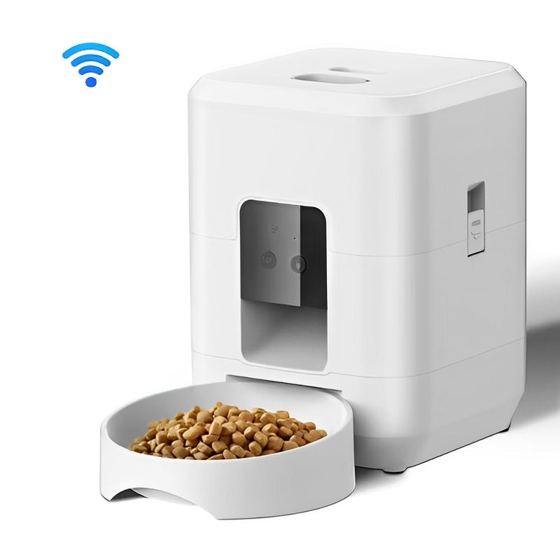 White pet feeder with bowl of food and smartphone displaying app interface on a white background