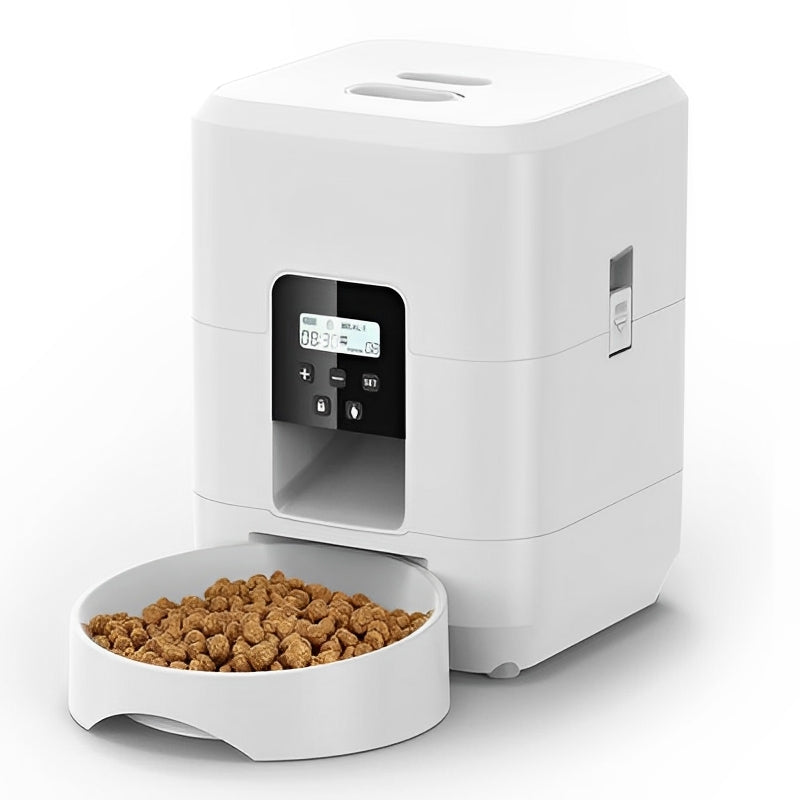White pet food dispenser with a bowl of kibble on a white background